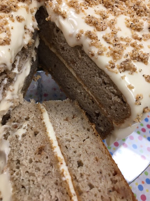 Two layer banana cake iced with a cream cheese frosting.