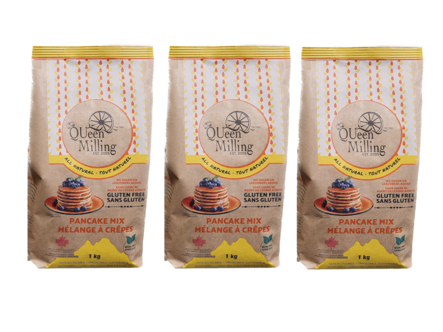 Made in Canada Gluten free pancake mix.   Superfine granulator. No sugar, no xanthan gum, or leaveners added.  Packed in a 100% recyclable and compostable paper bag.  1kg size.  3 pack size.  Kraft paper bag with bright yellow and orange colouring.  Picture of pancakes topped with fresh blueberries.
